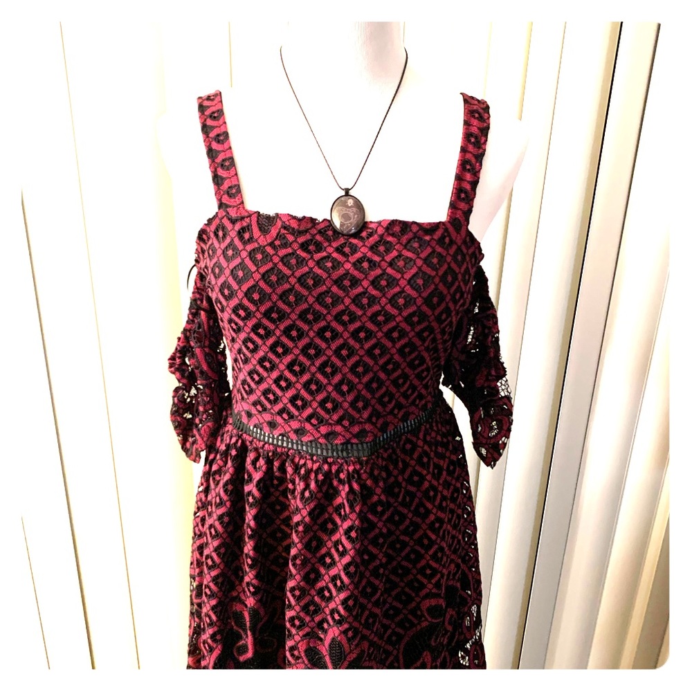 Francesca’s wine and black dress